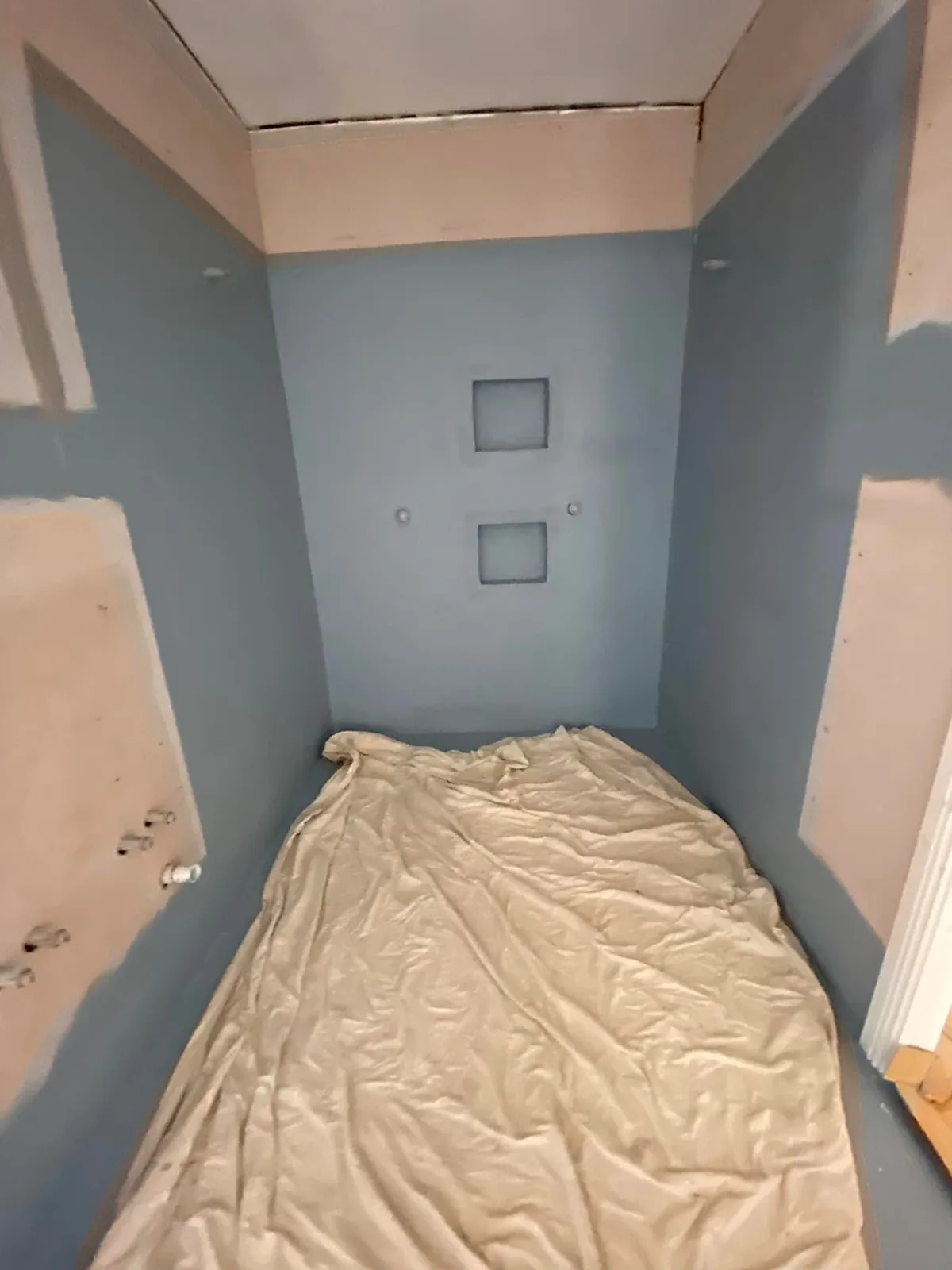Shower recess with two niches after waterproofing, ready for tiles